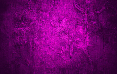 Purple concrete wall texture background. Cement wall with red and purple neon on dark background