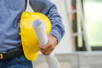 Engineer holding hard hat construction worker professional safety work industry building person manager service