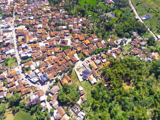 Fototapeta na wymiar Abstract Defocused Blurred Background Aerial photography a view of mapping a densely populated residential area in the hill valley in the Cikancung area - Indonesia. Not Focus