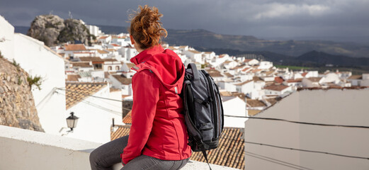 woman looking at typical spanish city