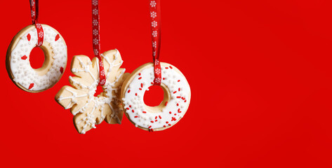 Christmas cookies on red background banner.