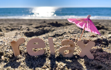 relax word on the beach