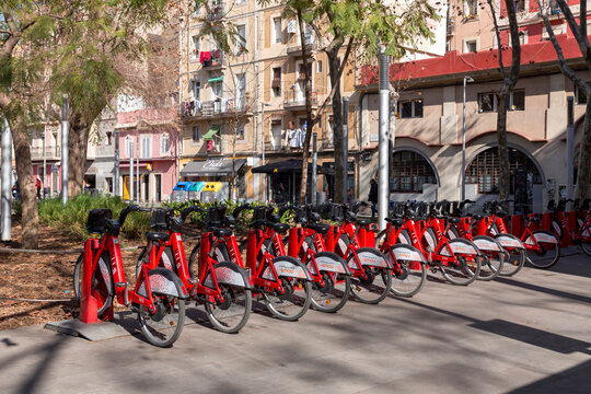 Bicing electric bikes parked at the charging station in Barcelona, supported by Smou app