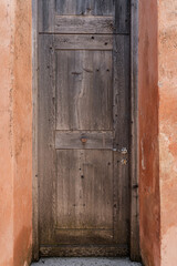 Old vintage wooden door. Travel concept. Traditional European old town building. Old historic architecture