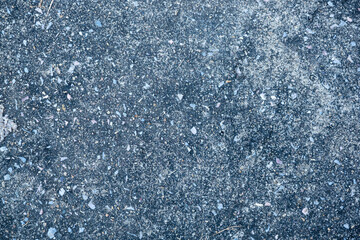 Top view closeup texture of dirty concrete floor background. Rough surface of flat floor, small stone and material for construction.