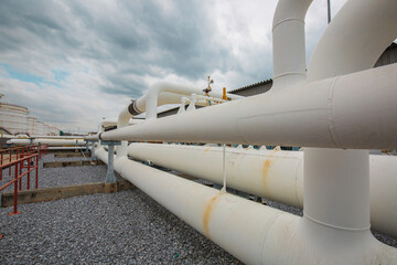 Steel long pipes and pipe elbow in station oil factory during refinery Petrochemistry industry