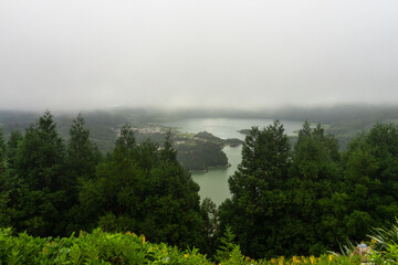 Aerial view of Lago Azul and Lago Verde in a cloudy and foggy day, Sete Cidades, Sao Miguel island, Azores Portugal