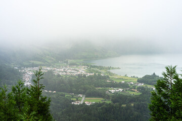 Aerial view of Lago Azul and Lago Verde in a cloudy and foggy day, Sete Cidades, Sao Miguel island, Azores Portugal