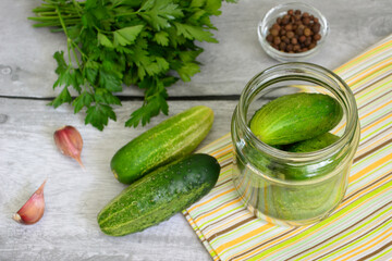 marinating cucumbers for winter in jars with spices and garlic