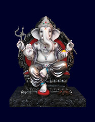 Hindu God Ganesha on Blue background, Ganesha Idol. Ganesh festival.