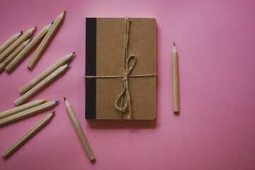  Eco cardboard notepad for notes, tied with sacking rope bow flatly. Wooden pink pencil for journal...