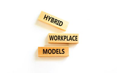 Hybrid workplace models symbol. Concept words Hybrid workplace models on wooden blocks. Beautiful...