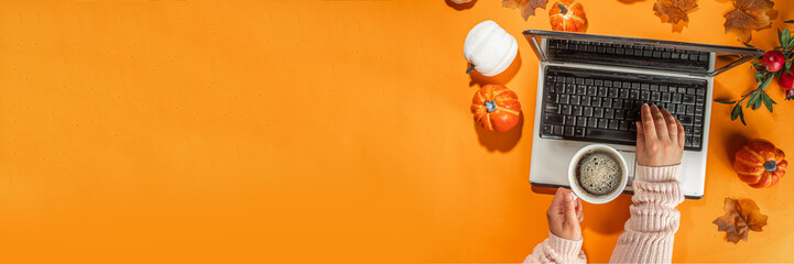 Cozy fall background with laptop