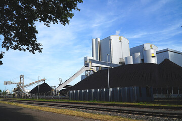 Large coal dump at coal-fired power plant in Hannover, Lower Saxony, Germany. An old technology that is partly responsible for global warming.