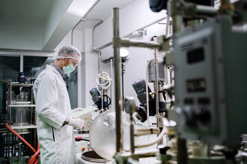 Scientists research herbal natural medicine, organic extraction and natural science in glassware, laboratories and development concepts. Scientists research medicine extract cbd oil from cannabis