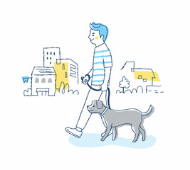 犬の散歩をしている若い男性
