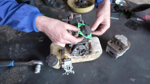 replacement of the engine gasket,repair of the mower and installation of new gaskets on the piston