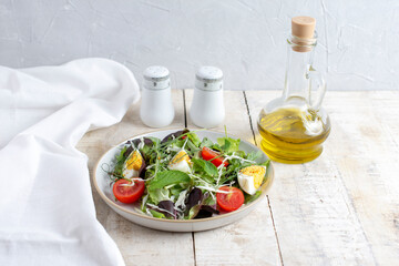 Fresh salad with cherry tomato, cabbage , boiled eggs and fresh lettuce. Ketogenic diet breakfast. Keto, paleo salad.