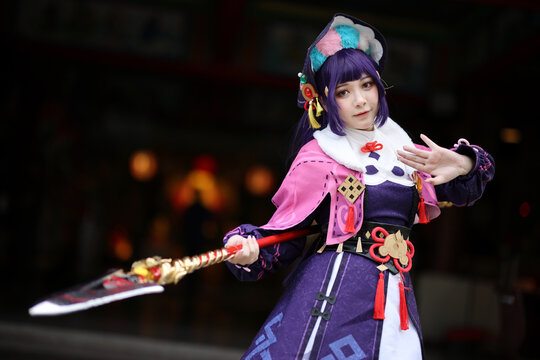 Portrait of a beautiful young woman game Cosplay with Chinese dress