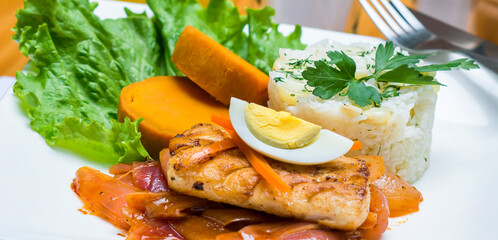 Escabeche fried fish onion salad boiled egg peruvian traditional gourmet food