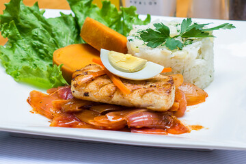 Escabeche fried fish onion salad boiled egg peruvian traditional gourmet food