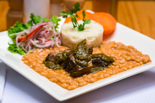 Frejoles con seco beans and meat stew de carne traditional peruvian food