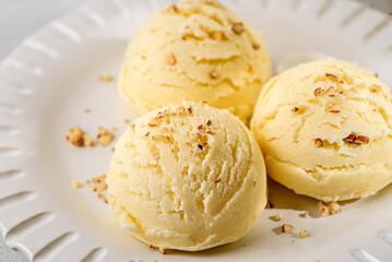 ice cream in balls with nuts