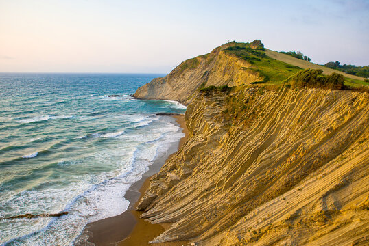 view of the flysch rocks in the bay of zumaia and the beach itzurun