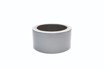 Roll of gray adhesive tape on a white background. Adhesive tape for repair work and cable communications. Adhesive tape for moisture protection or for assembly and packaging