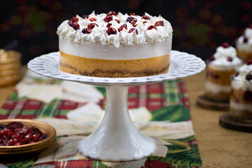 Festive Christmas pumpkin and cranberry mousse on cake stand
