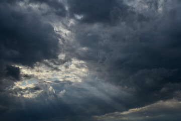 Naklejka na ściany i meble Dark dramatic clouds in the sky before the rain 