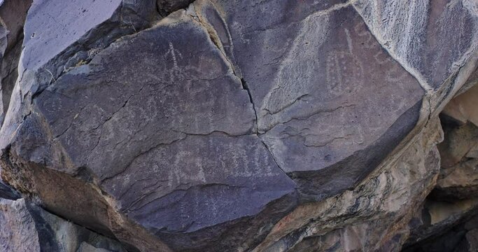 Petroglyphs on the sides of rocks in the Mojave Desert, California