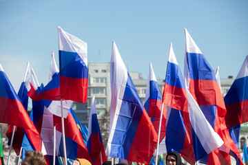 Russian flag fluttering on the blue sky background