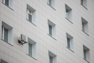 facade of a new multi-storey building with many windows