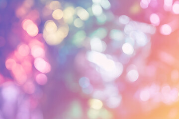 Obraz premium Blurred bokeh background for Christmas and New Year holiday. Abstract pastel pink gradient color wallpaper with defocused lights. Copy space