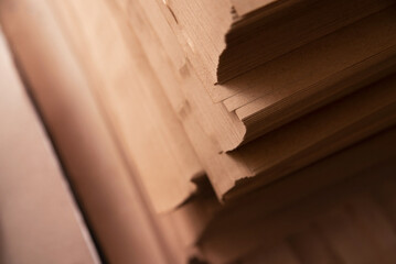 Top view of sheets of kraft paper for wrapping gifts, books, various things, selective focus. Craft paper for packaging