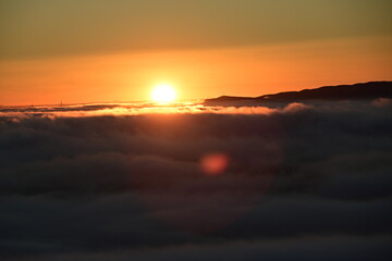 Obraz premium sun above the clouds