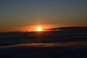 Fototapeta na wymiar sun above the clouds