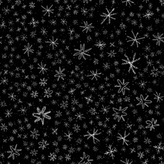 Hand Drawn Snowflakes Christmas Seamless Pattern. Subtle Flying Snow Flakes on chalk snowflakes Background. Authentic chalk handdrawn snow overlay. Bold holiday season decoration.