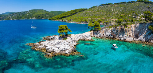 Panoramic view of the famous Amarantos Cape with three Pine Trees known from the Mamma Mia movie,...