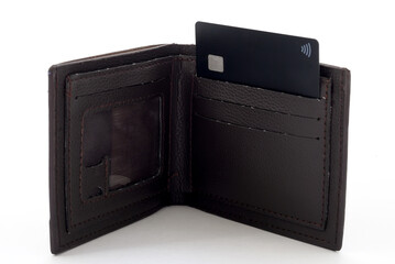 brown leather wallet and black credit card close-up on white background - obrazy, fototapety, plakaty