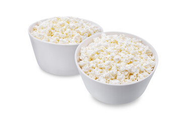 Cottage cheese in a bowl on a white isolated background