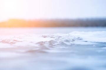 Snow on ice, close-up for background, winter landscape