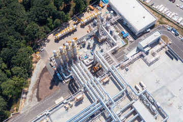 Top view of the pipeline system of a chemical plant, air purification system on the roof of a...