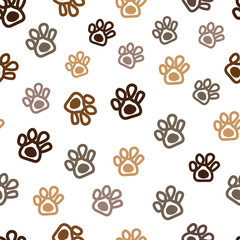 Doodle paw prints with funny pumpkin. Happy Halloween card. Fabric design seamless pattern