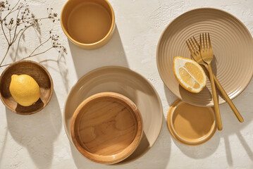 Set of clean tableware on white background