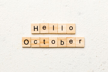 hello october word written on wood block. hello october text on table, concept © sosiukin