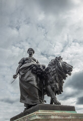 London, England, UK - July 6, 2022: Victoria Memorial. Closeup of black bronze Agriculture statue...