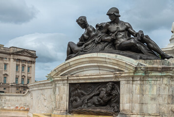 London, England, UK - July 6, 2022: Victoria Memorial. Black bronze female-male statue above...