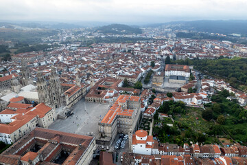 Obraz premium Aerial drone view of the Praza de Obraidoro in Santiago de Compostela, the monumental center of the Galicia community in Spain.